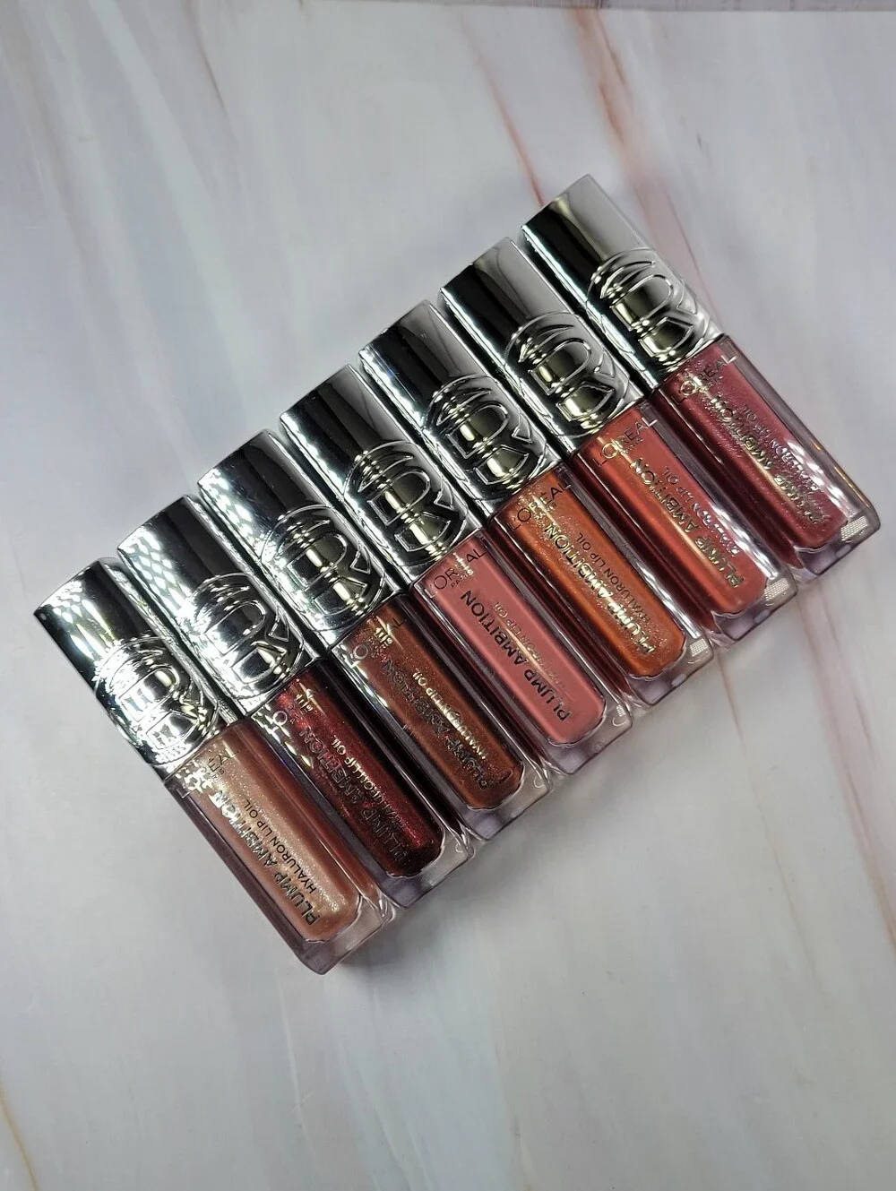 7 Piece L'Oréal Plump Ambition Hyaluron Lip Oil Bundle NEW!